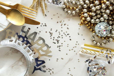 High angle view of various objects on table