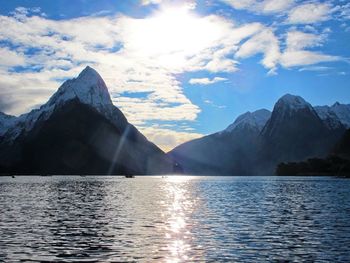 Scenic view of lake with mountains in background