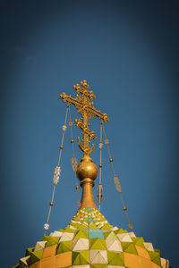 Low angle view of sculpture against clear sky