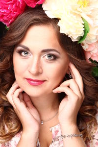 Portrait of young woman wearing floral crown