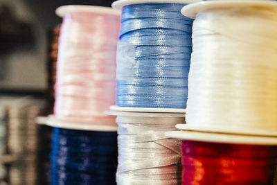 Close-up of colorful ribbon spools