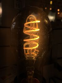 Close-up of illuminated light bulb