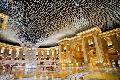Low angle view of illuminated ceiling