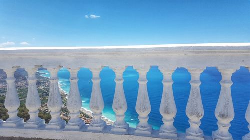 Panoramic shot of row against blue sky