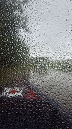 Close-up of water drops on glass window