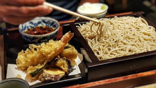 Close-up of man holding food