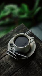 High angle view of coffee cup on table