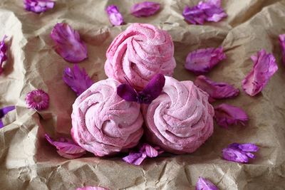 Close-up of rose petals on table