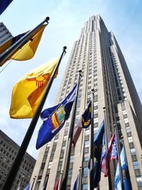 Low angle view of flag against sky