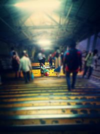 Blurred motion of people in shopping mall