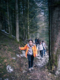 Full length of a man walking in forest