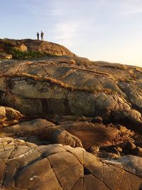 Scenic view of rock formations against sky