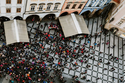 High angle view of people on street against buildings
