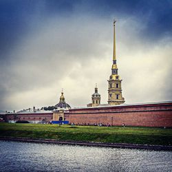 Built structure against cloudy sky