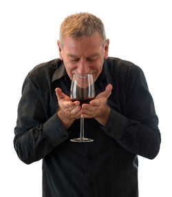 Man drinking water from glass