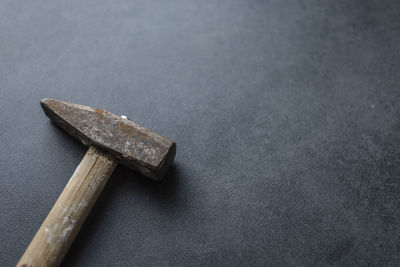 High angle view of cross on table