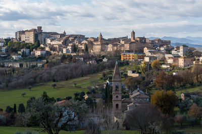 High angle shot of townscape against sky