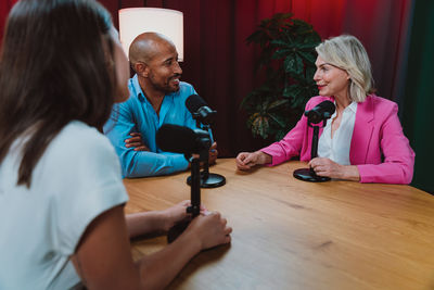 Portrait of male friends working at home