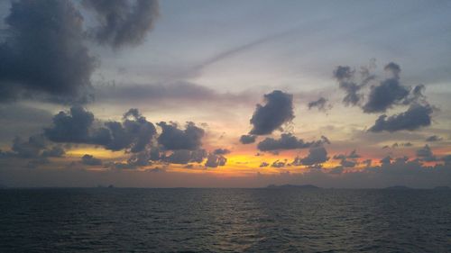 Scenic view of sea at sunset