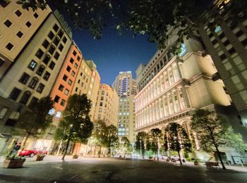 City street amidst buildings against sky