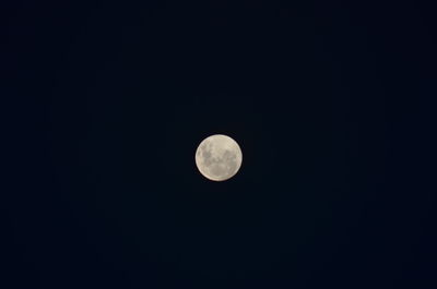 Scenic view of moon against clear sky at night