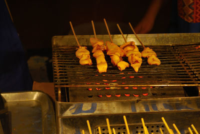 High angle view of meat on barbecue grill