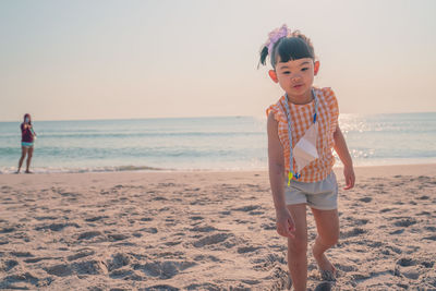 Full length of girl on beach