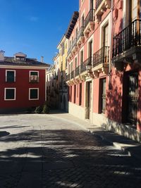 Street amidst houses in town