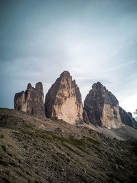 Rock formations on landscape against sky, drei zinnen, tre cime di lavaredo