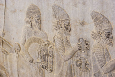 Close-up of carving on temple  at persepolis