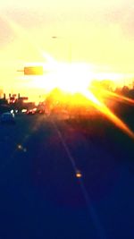 Sun shining through clouds