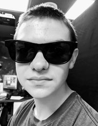 Close-up portrait of boy wearing sunglasses