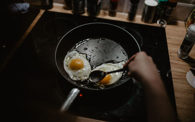 Midsection of man preparing food