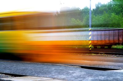 Blurred motion of cars on road