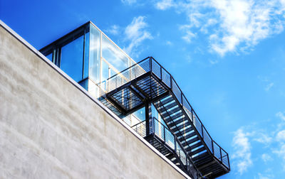 Low angle view of built structure against blue sky