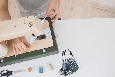 High angle view of woman working on table