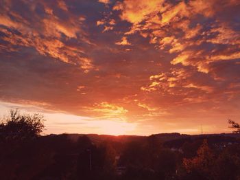 Scenic view of dramatic sky during sunset