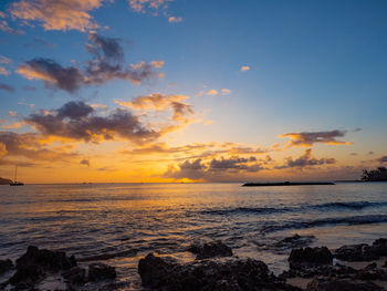 Scenic view of sea against sky during sunset