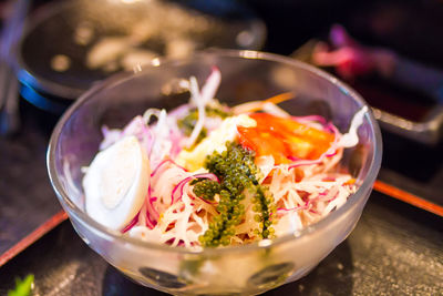 High angle view of salad in bowl on table