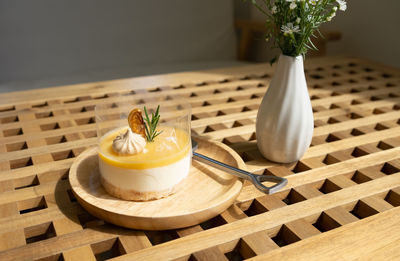 Lemon cheese pie served on table in cafe