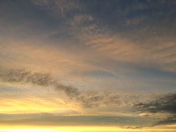 Low angle view of dramatic sky during sunset