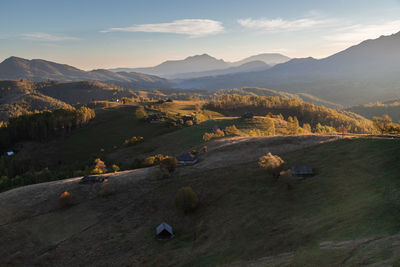 Scenic view of landscape against sky during sunset