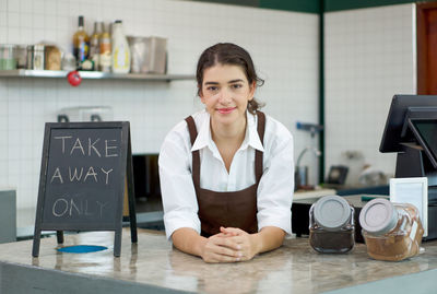 Portrait of barista at cafe