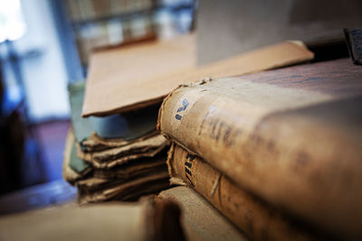 Close-up of old stack of books