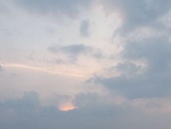 Low angle view of rainbow in sky