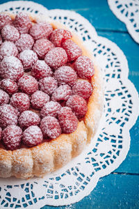 Close-up of cake with strawberries on table