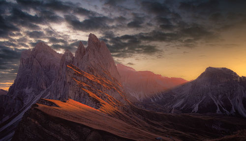 Scenic view of mountains against sky during sunset