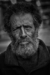 Close-up portrait of mature bearded man