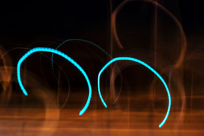 Light painting against black background