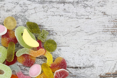 High angle view of fruits on snow